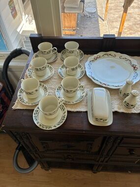 The Limited White Porcelain Tea Cup and Saucer Set with Green Holly Trim